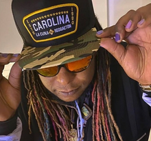 Load image into Gallery viewer, Gorra Carolina Camo – La Cuna del Reggaetón