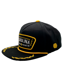 Load image into Gallery viewer, Gorra Carolina Boricua – La Cuna del Reggaetón